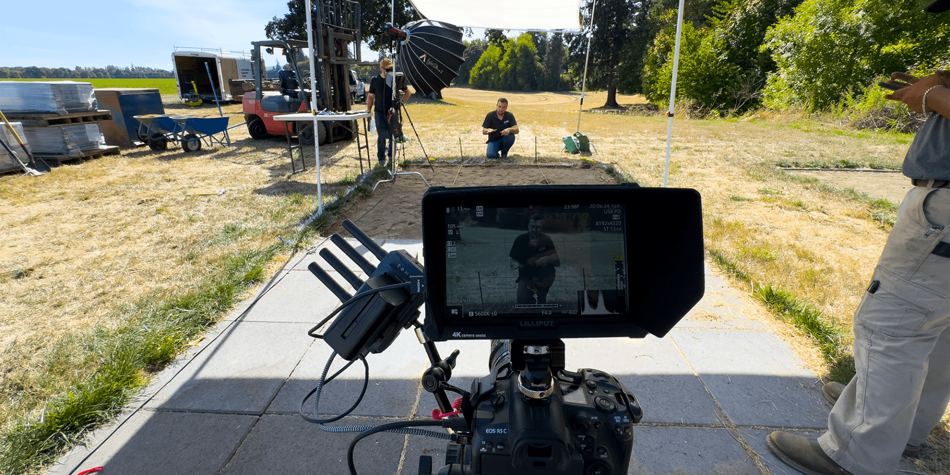 Professional video production setup with cinema camera and crew